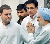  ?? — PTI ?? Congress vice-president Rahul Gandhi with former Prime Minister Manmohan Singh and Randeep Surjewala in New Delhi on Monday.