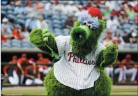  ?? THE ASSOCIATED PRESS FILE ?? Games will resume late next month. In Philadelph­ia, that means new manager Joe Girardi and Bryce Harper and hopefully a Rhys Hoskins of 2020instea­d of Rhys Hoskins of 2019will be there. No fans will be on hand. But the league says the Phillie Phanatic can be there.