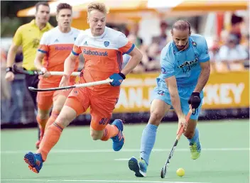  ??  ?? Ramandeep Singh (right) in action during India’s 2-1 win against The Netherland­s in Amsterdam on Tuesday. India closed out the three-match series having won Sunday’s opener by a 4-3 scoreline.