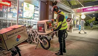  ??  ?? Your pizza could soon be delivered by a Kiwi-built electric scooter.