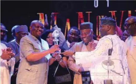  ??  ?? Governor Wike receiving his award