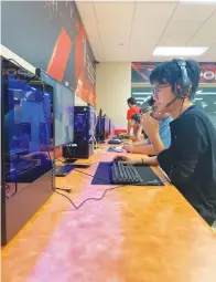  ?? Staff photo by Andrew Bell ?? ■ Esports athletes practice games like League of Legends, Valorant and Rocket League in the Texas High School Esports Arena.