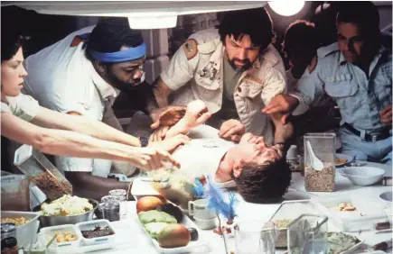  ?? 20TH CENTURY FOX ?? Kane (John Hurt) comes to a horrific end as Ripley (Sigourney Weaver) and crew try to help in “Alien.”