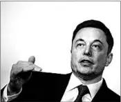  ?? BRENDAN SMIALOWSKI/GETTY-AFP ?? Critics of Elon Musk have compared the Tesla and SpaceX CEO’s personalit­y to that of President Donald Trump.