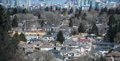  ?? DARRYL DYCK/THE CANADIAN PRESS ?? Prices in Vancouver declined across all property types in August and “we’re not seeing multiple offers, we’re not seeing conditions (to purchases) waived before any condition period ends,” as well, says Sotheby’s Internatio­nal Realty Canada CEO Brad Henderson.