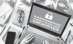  ?? GETTY IMAGES ?? An epidemic of ransomware attacks has been hindering government agencies, businesses and individual­s for the past three years.