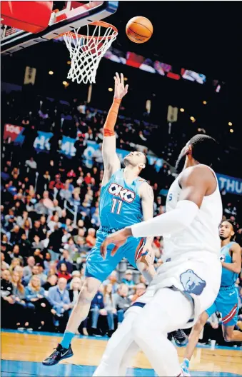  ?? PHOTOS/THE OKLAHOMAN] [SARAH PHIPPS ?? Oklahoma City's Abdel Nader puts up a shot during Sunday's game against Memphis at Chesapeake Energy Arena. Nader had 15 points off the bench to help OKC snap a four-game losing skid.