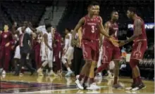  ?? ANDRES KUDACKI — THE ASSOCIATED PRESS ?? Temple players celebrate after beating Florida State in the semifinals of the NIT Season Tip-Off tournament in New York on Thursday.