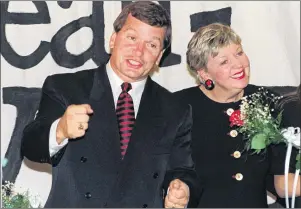  ?? CP PHOTO ?? Premier Frank McKenna and his wife Julie celebrate the massive Liberal victory in the New Brunswick provincial election in Miramichi, N.B., on Sept. 11, 1995. The Liberals won 45 of 55 seats. Twenty years ago Friday, Frank McKenna fulfilled a promise...