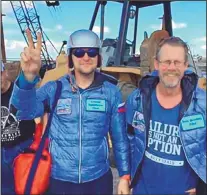  ?? COURTESY OF ESCANDRA SALIN/TWO EAGLES BALLOON TEAM Two Eagles balloon pilots Leonid Tiukhtyaev, left, and Troy Bradley, arrive in Puerto San Carlos, Baja California, Mexico, on Saturday, after completing their successful trans-Pacific flight to break worl ??