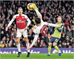  ??  ?? Worth the wait: Lucas Torreira’s acrobatic goal secures victory for Arsenal yesterday