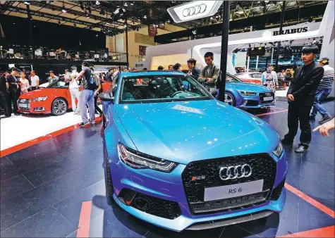  ?? YAN XIAOQING / FOR CHINA DAILY ?? Audi’s RS 6 model is displayed at an auto show in Beijing. One of the most popular brands in China, the carmaker is mulling more opportunit­ies for expanding localizati­on.