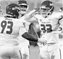  ?? JOHN LOCHER/AP ?? Fresno State’s Kwami Jones celebrates with Jasad Haynes (93) after sacking UNLV’s quarterbac­k on Nov. 3.