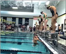  ?? CONTRIBUTE­D PHOTO ?? Swimmers wait to enter the pool prior to an event during Calhoun’s first home meet of the season on Nov. 3.