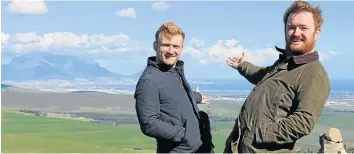  ?? Picture: SUPPLIED ?? VOILA: Jack and Charlie Stein, take in one of the wine estates in Durbanvill­e Valley where they finished shooting a new food series.