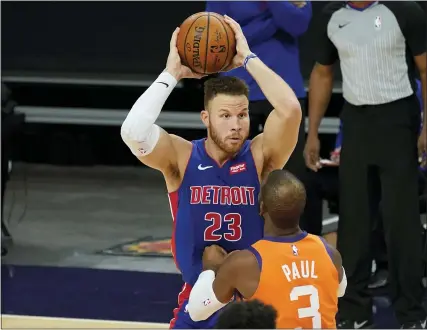  ?? ASSOCIATED PRESS FILE PHOTOS ?? Former Detroit Pistons forward Blake Griffin (23) looks to pass over Phoenix Suns guard Chris Paul (3) during the first half of a Feb. 5game in Phoenix.