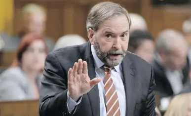  ?? ADRIAN WYLD/THE CANADIAN PRESS ?? The trouble with NDP Leader Tom Mulcair’s stance on tax-free savings accounts, says writer James Gordon, is that it misreprese­nts what they are about, who uses them, and how big an advantage they are to the ‘rich.’