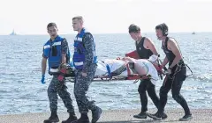  ?? JAPAN DEFENCE MINISTRY/AP ?? An injured ‘Fitzgerald’ personnel is carried by US military personnel and Japanese Maritime Self-Defence Force members in Yokosuka on Saturday.