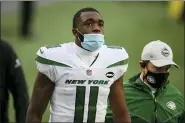  ?? STEW MILN - THE ASSOCIATED PRESS ?? FILE - New York Jets wide receiver Denzel Mims (11) walks to the locker room after an injury during an NFL football game against the New England Patriots in Foxborough, Mass., in this Sunday, Jan. 3, 2021, file photo. Mims is done with salmon.