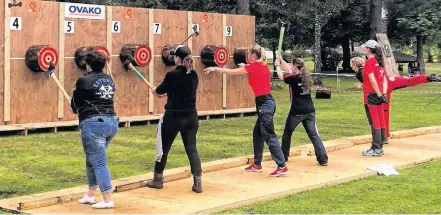  ?? SUZY ATWOOD PHOTO ?? Competitor­s lineup to throw at the World Double-bit Axe Throwing Championsh­ips in Hallefors, Sweden in 2019. The internatio­nal competitio­n will be hosted in the Municipali­ty of Barrington this summer.