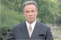  ??  ?? THE GREY HAIRS ARE REAL: John Travolta as John Gotti from the mobster biopic ‘Gotti.’ The film premiered at Cannes last week.