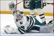  ?? JEFF ROBERSON — THE ASSOCIATED PRESS ?? Sharks goaltender Kaapo Kahkonen watches a loose puck during the second period against the Blues on Thursday in St. Louis.