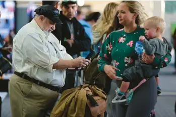  ?? ?? Passengers arrive Tuesday at Lehigh Valley Internatio­nal Airport.