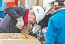  ?? PHOTO BY JASON FRANSON/THE CANADIAN PRESS VIA AP ?? Former President Jimmy Carter helps build homes for Habitat for Humanity in Edmonton, Alberta, on Tuesday.
