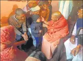  ?? HT PHOTO ?? Chief minister Yogi Adityanath meeting the bereaved family of slain CRPF jawan Pankaj Tripathi in Maharajgan­j on Sunday.