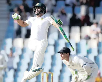  ??  ?? OVER THE MOON: Faf du Plessis jumps for joy yesterday as he reaches his fifth Test century. The stand-in South African captain had to grind his way to three figures against a tough New Zealand attack. Picture: Reuters