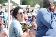  ?? File photo ?? Smiles lit up the faces of dogs and their owners alike during the 2022 Wiener Takes All: The Fast and Furry fundraiser event for the Bella Vista Animal Shelter. The event returns on Saturday, Oct. 14, at the Bella Vista Softball Complex.