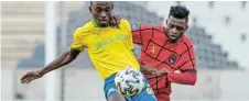  ??  ?? GAME DECIDER: Peter Shalulile, front, of Mamelodi Sundowns and Macbeth Mahlangu of TS Galaxy during the Premiershi­p game at the Mbombela Stadium on Sunday.