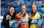  ?? ?? Siobhan Haughey on the podium with 100m free winner Marrit Steenberge­n and Shayna Jack.