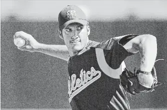  ?? ASSOCIATED PRESS FILE PHOTO ?? Closer Huston Street, then pitching for the Oakland Athletics, works against the San Francisco Giants in this March 9, 2005, photo during a spring training game in Phoenix.