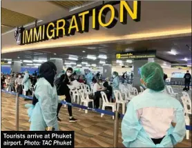  ?? Photo: TAC Phuket ?? Tourists arrive at Phuket airport.