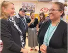  ?? SUSAN MONTOYA BRYAN/ASSOCIATED PRESS ?? Chief school administra­tor Willinda Castillo, right, and U.S. Rep. Melanie Stansbury, D-N.M., celebratin­g the securing of $90 million in federal funds for a new school at To’Hajiilee. The U.S. Bureau of Indian Education estimates it would cost roughly $6.2 billion to address the needs of BIA schools in poor condition.