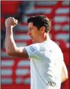  ??  ?? Robert Lewandowsk­i of Munich celebrates his side’s opening goal during the German Bundesliga soccer match between Union Berlin and Bayern Munich in Berlin, Germany,
on May 17. (AP)