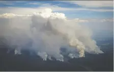  ?? THE CANADIAN PRESS/FILES ?? Even after four years since the fire died out, rains are still washing significan­t increases in ash, potassium, nitrogen, calcium and heavy metals into the Athabasca River.