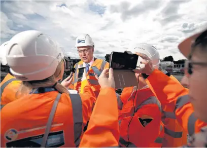  ?? Joel Goodman ?? ●●Chris Grayling talking to the media during a visit to the A6 relief road