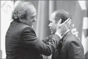  ?? Walter Bieri
Associated Press ?? UEFA’S Michel Platini, left, and Jordan’s Prince Ali bin al-Hussein are likely candidates to lead FIFA.