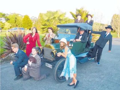  ?? Photo / Malcolm McMillan ?? Preparatio­ns are stepping up for Kerikeri Youth Theatre’s production of a gangster comedy musical set in 1920s New York. A few of the 55-strong cast have been posing for publicity shots with a Model T Ford owned by Kerikeri’s Brian Atchison. The 1913 vintage car, affectiona­tely known as Genevieve, was previously owned by Peter O’Dell of Pete’s Pioneer Museum. The show dates are October 24, 25, 27 and 28; tickets are $28 adults or $15 students from the Turner Centre.