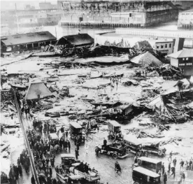  ??  ?? On 15 January 1919, a massive tank containing 2.2m gallons of molasses burst in Boston, causing the death of 21 people. Photograph: Bettmann/Bettmann Archive