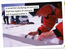  ?? ?? core A scientist studying an ice that has layers of volcanic ash trapped within it