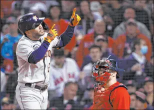  ?? Winslow Townson The Associated Press ?? The Astros’ Jose Altuve celebrates after a home run in the eighth inning in Game 4 of the ALCS on Tuesday in Boston.