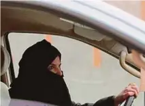  ?? REUTERS PIC ?? The lifting of the driving ban on women in Saudi Arabia would save the economy SR20 billion in salaries and work permit fees of male expatriate drivers from Bangladesh and India.