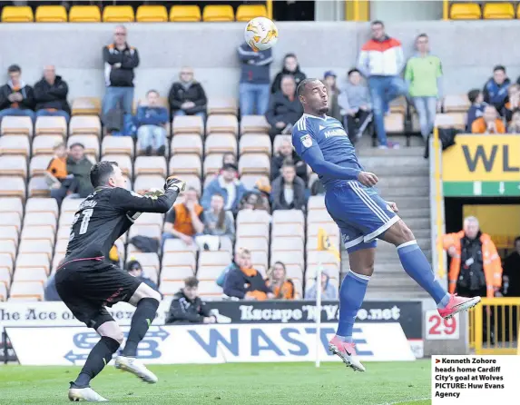  ??  ?? > Kenneth Zohore heads home Cardiff City’s goal at Wolves PICTURE: Huw Evans Agency