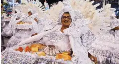  ?? ?? Revelers of the Academicos do Tatuape samba school perform.