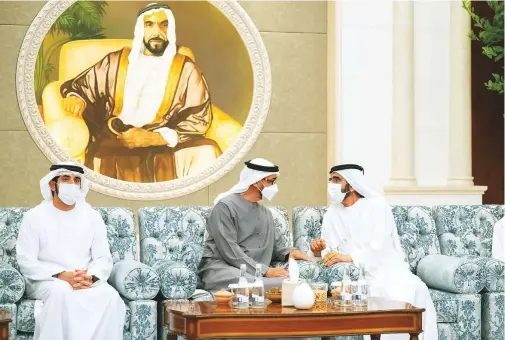  ?? WAM ?? Left: Shaikh
■
Mohammad Bin Zayed Al Nahyan with Shaikh Mohammad Bin Rashid and Shaikh Hamdan Bin Mohammad Bin Rashid at the Al Mushrif Palace yesterday.