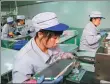  ?? XINHUA ?? Employees work at a new energy car battery factory in Xingtai, Hebei province.