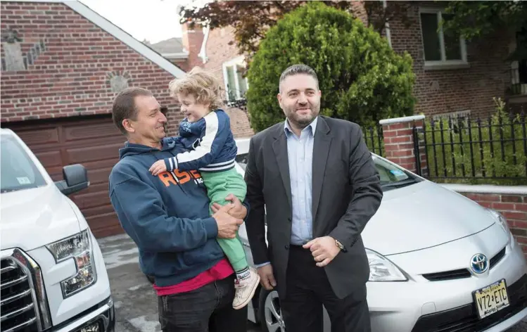  ?? Edwin J. Torres / New York Times ?? Angelo Di Maria, left, had trouble finding a buyer for the lease on a 2013 Toyota Prius driven by his father-in-law, right, whose company had given him a Ford pickup.